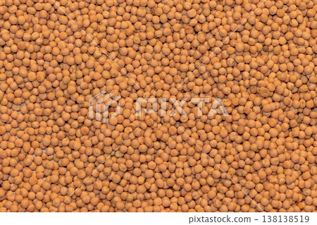 Dried soybeans pile on agricultural fair 138138519