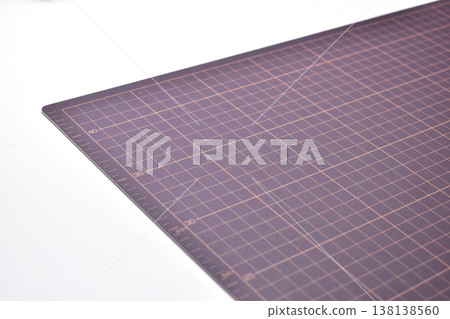 black cutting mat board on white background with line and scale measure guide pattern for object art design, tool equipment of diy craft work 138138560
