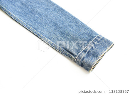 sleeve of blue denim shirt texture isolated on white background, jean fashion style sleeve of blue denim shirt texture isolated on white background, jean fashion style 138138567