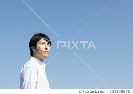 Outdoor, sky background, male portrait 138138678