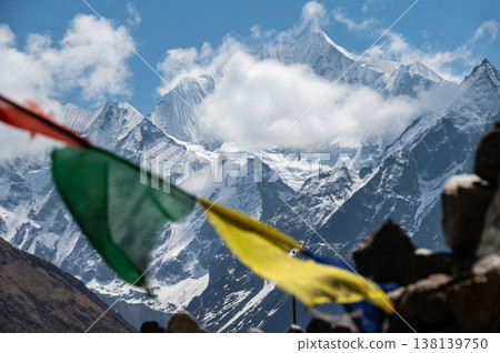 Beautiful view of Mt.Gangchempo (6,387 m) look through prayer flags in Langtang valley of Nepal.  138139750