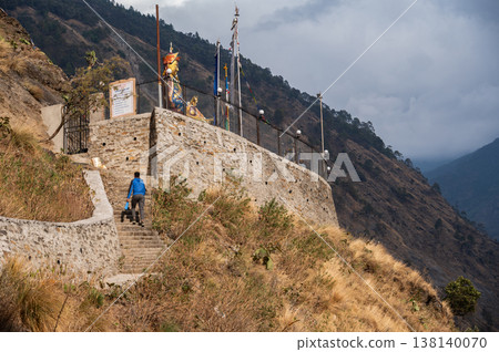 Statue of Guru Rinpoche on the small hill in Syabrubesi a beautiful resident village inside the Langtang National Park of Nepal. Statue of Guru Rinpoche on the small hill in Syabrubesi a beautiful resident village inside the Langtang National Park of Nepal. 138140070