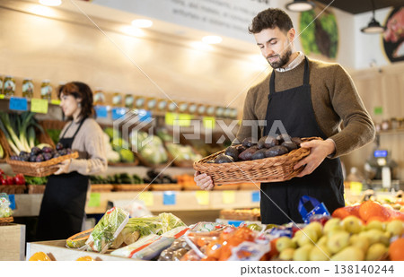 Eco food vegetable market, man worker and avocado. Eco food vegetable market, man worker and avocado. 138140244