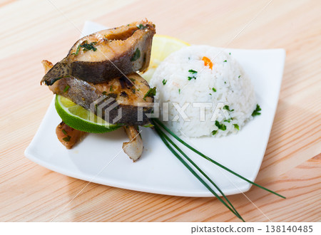 Baked trout steaks with white rice Baked trout steaks with white rice 138140485