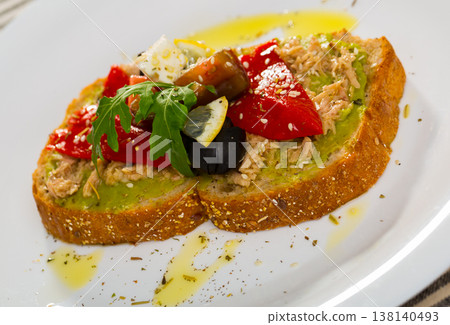 Sandwiches with guacamole, canned fish, pepper, feta Sandwiches with guacamole, canned fish, pepper, feta 138140493