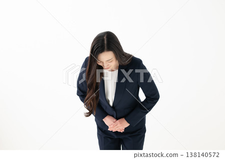 Business woman receptionist bowing Business woman receptionist bowing 138140572