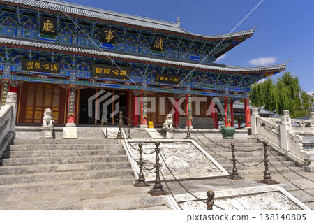 Lijiang, China - April 11, 2024 : Main pavilion at Mufu Palace in Lijiang old town, China on April 11, 2024. Lijiang, China - April 11, 2024 : Main pavilion at Mufu Palace in Lijiang old town, China on April 11, 2024. 138140805