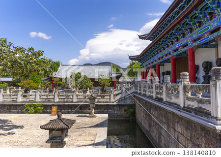 Lijiang, China - April 11, 2024 : Main pavilion at Mufu Palace in Lijiang old town, China on April 11, 2024. Lijiang, China - April 11, 2024 : Main pavilion at Mufu Palace in Lijiang old town, China on April 11, 2024. 138140810