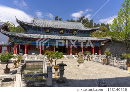 Lijiang, China - April 11, 2024 : Main pavilion at Mufu Palace in Lijiang old town, China on April 11, 2024. Lijiang, China - April 11, 2024 : Main pavilion at Mufu Palace in Lijiang old town, China on April 11, 2024. 138140836