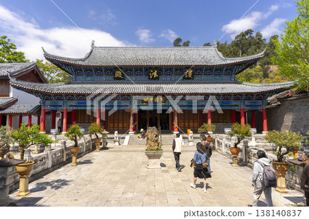 Lijiang, China - April 11, 2024 : Main pavilion at Mufu Palace in Lijiang old town, China on April 11, 2024. Lijiang, China - April 11, 2024 : Main pavilion at Mufu Palace in Lijiang old town, China on April 11, 2024. 138140837