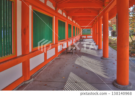 Red Colonnade Walkway With Green Shutter Windows Nov 28 2025 138140968