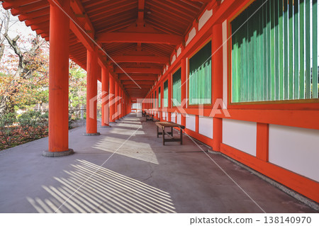 Red Colonnade Walkway With Green Shutter Windows Nov 28 2025 138140970