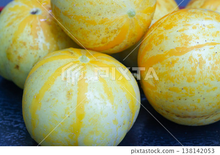 Round zucchini in a shop window Round zucchini in a shop window 138142053