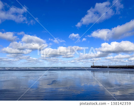Nieuwpoort, West-Vlaanderen, Belgium, Ocotber 25th, 2025, Tranquil shoreline featuring reflective Nieuwpoort, West-Vlaanderen, Belgium, Ocotber 25th, 2025, Tranquil shoreline featuring reflective 138142359