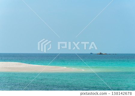Beautiful Andaman sea, Tropical Turquoise clear blue sea and white sand beach on pattaya beach with blue sky background - summer vacation travel. at Tarutao national park and Koh Lipe in Satun, Beautiful Andaman sea, Tropical Turquoise clear blue sea and white sand beach on pattaya beach with blue sky background - summer vacation travel. at Tarutao national park and Koh Lipe in Satun, 138142678