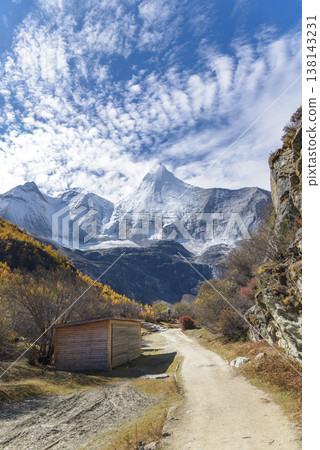 The last Shangri La, Yangmaiyong (or Jampayang in Tibetan) mountain peak in Yading, Daocheng County, Sichuan Province, China. 138143231