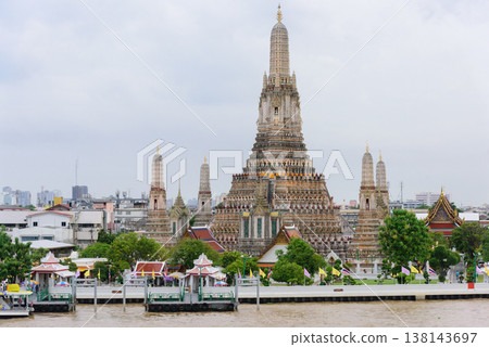 Bangkok, Thailand - June 11, 2025: Pagoda at Wat Arun, or Wat Arun Ratchawararam, is a tourist landmark near the Chao Phraya River in Bangkok,Thailand. Bangkok, Thailand - June 11, 2025: Pagoda at Wat Arun, or Wat Arun Ratchawararam, is a tourist landmark near the Chao Phraya River in Bangkok,Thailand. 138143697