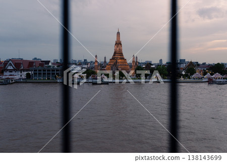 Bangkok, Thailand - June 11, 2025: Pagoda at Wat Arun, or Wat Arun Ratchawararam, is a tourist landmark near the Chao Phraya River in Bangkok,Thailand. 138143699