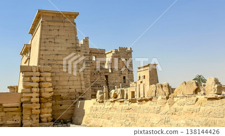 Medinet Habu, the mortuary temple of Ramesses III, located on the west bank of Luxor, Egypt. Medinet Habu, the mortuary temple of Ramesses III, located on the west bank of Luxor, Egypt. 138144426