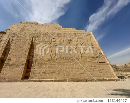 Medinet Habu, the mortuary temple of Ramesses III, located on the west bank of Luxor, Egypt. Medinet Habu, the mortuary temple of Ramesses III, located on the west bank of Luxor, Egypt. 138144427