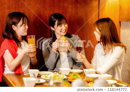 A woman toasting A woman toasting 138144772