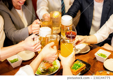A man toasting in a pub A man toasting in a pub 138144775