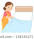 Woman changing sheets (caregiver) 138145271