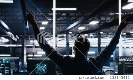 Delighted developer celebrating in data center after successfully coding with generative AI. Overjoyed employee doing high five with colleague after leveraging AI large language model, camera A Delighted developer celebrating in data center after successfully coding with generative AI. Overjoyed employee doing high five with colleague after leveraging AI large language model, camera A 138145411