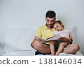 Father reading story to his daughter 138146034