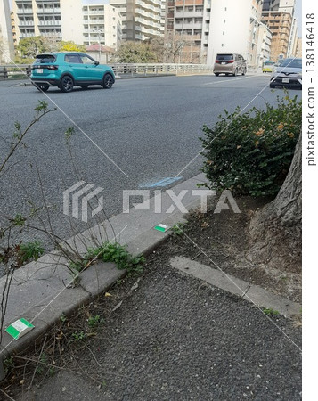 Cars crossing the bridge; automobiles; asphalt road. Cars crossing the bridge; automobiles; asphalt road. 138146418