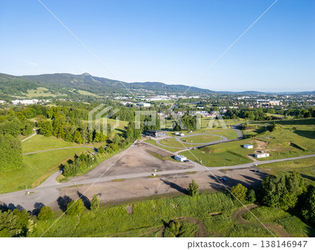 Vesec Sport Area is near Liberec in Czechia. This location was built for cross-country skiing during the Nordic World Ski Championships. It has trails and facilities for winter sports. 138146947