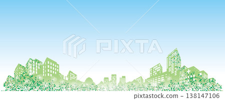 The refreshing greenery of spring and the silhouettes of modern buildings. An early summer urban landscape and an eco-friendly image. 138147106