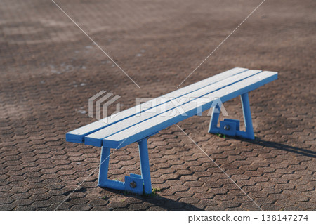 The benches have turned white with frost. The benches have turned white with frost. 138147274