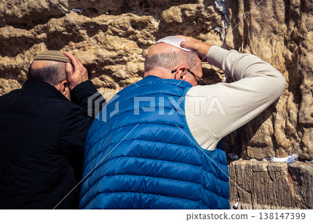 Jewish men in prayer at the Western Wall, Jerusalem Jewish men in prayer at the Western Wall, Jerusalem 138147399
