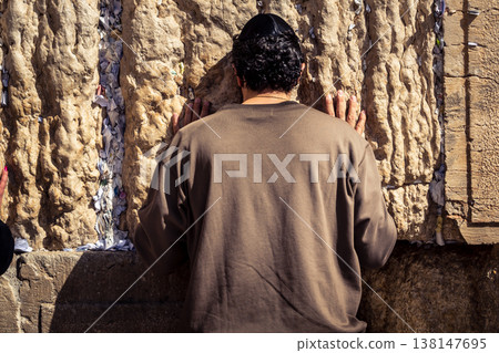 Jewish men in prayer at the Western Wall, Jerusalem Jewish men in prayer at the Western Wall, Jerusalem 138147695