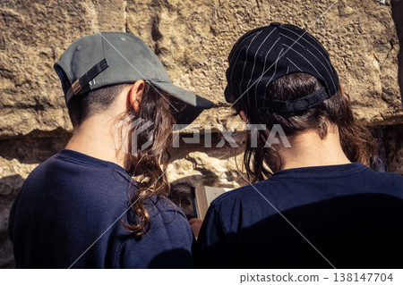 Young Jewish boys praying at the Western Wall, Jerusalem Young Jewish boys praying at the Western Wall, Jerusalem 138147704