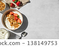 Balanced breakfast with yogurt, granola and strawberry on light background. Top view 138149753