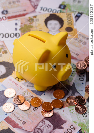 A piggy bank as a concept for storing, accumulating, and saving financial resources. A piggy bank A piggy bank as a concept for storing, accumulating, and saving financial resources. A piggy bank 138150127