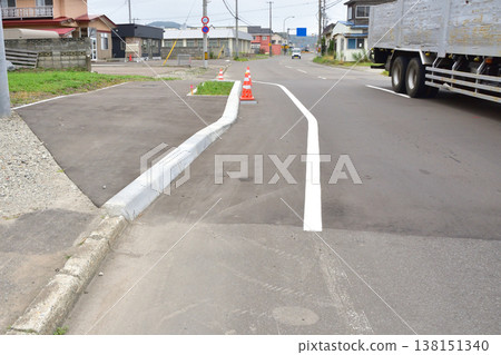 A sidewalk that has been widened in only a portion A sidewalk that has been widened in only a portion 138151340