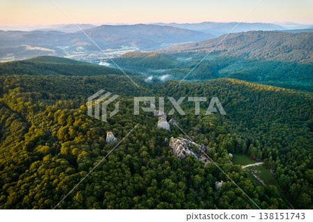 Beautiful panorama of alpine forest with green foliage, rocks and mountain slopes. Dovbush Rocks, Carpathian mountains, Ukraine. Beautiful panorama of alpine forest with green foliage, rocks and mountain slopes. Dovbush Rocks, Carpathian mountains, Ukraine. 138151743