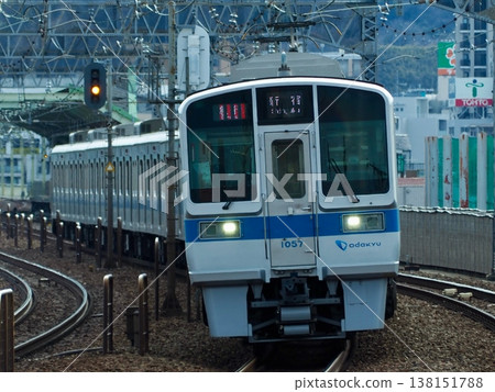 Odakyu 1000 series, train number 1057F, at Komae Station Odakyu 1000 series, train number 1057F, at Komae Station 138151788
