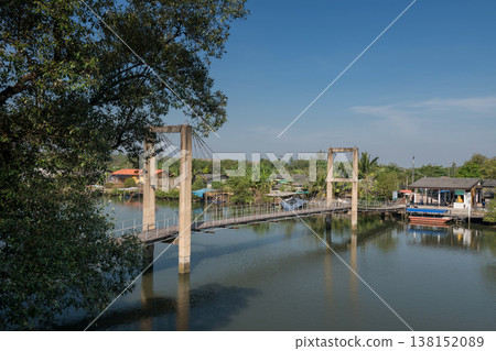 Raksamae suspension bridge over river to mangrove forest, Rayong 138152089