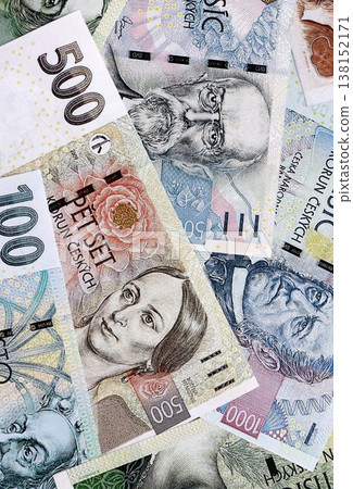 Czech koruna paper banknotes pile on table. Czech Republic CZK currency money bills in big amount. Concept of economics, taxation and banking in Czech Republic Czech koruna paper banknotes pile on table. Czech Republic CZK currency money bills in big amount. Concept of economics, taxation and banking in Czech Republic 138152171
