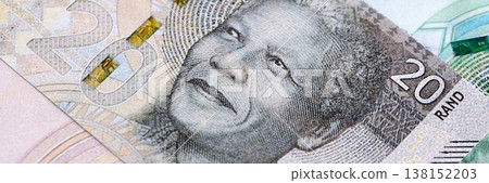 South African rand paper banknotes pile on table. South Africa ZAR currency money bills in big amount. Concept of economics, taxation and banking in South Africa 138152203