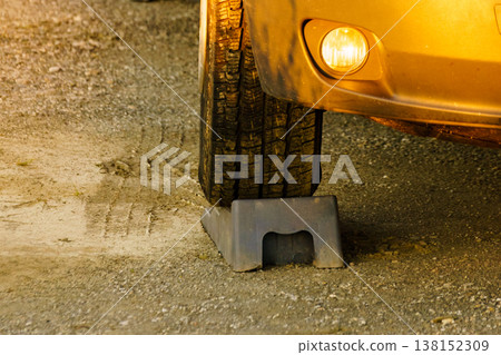 Camper leveling block in use. 138152309
