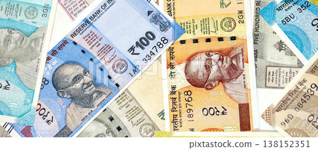 Big pile of Indian Rupees money bills banknotes close up. Lots of money of Indian INR currency cash in big bunch. Economics and business in India Big pile of Indian Rupees money bills banknotes close up. Lots of money of Indian INR currency cash in big bunch. Economics and business in India 138152351