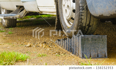 Camper leveling block in use. 138152353