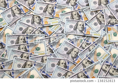 American dollars in one hundred banknotes. Lot of dollars close up. Stack of dollars and cash with a money background. US money and banknotes 138152813