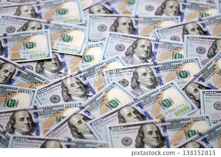 Money background with Franklin on the 100-dollar note. Texture of US dollar currency and banknotes. 100 USD bills. American hundred-dollar. Cash in dollar and credit theme with payment deposit money Money background with Franklin on the 100-dollar note. Texture of US dollar currency and banknotes. 100 USD bills. American hundred-dollar. Cash in dollar and credit theme with payment deposit money 138152815