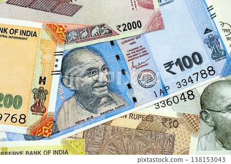 Big pile of Indian Rupees money bills banknotes close up. Lots of money of Indian INR currency cash in big bunch. Economics and business in India Big pile of Indian Rupees money bills banknotes close up. Lots of money of Indian INR currency cash in big bunch. Economics and business in India 138153043